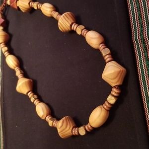 African wooden carved necklace mostly natural Brown in color